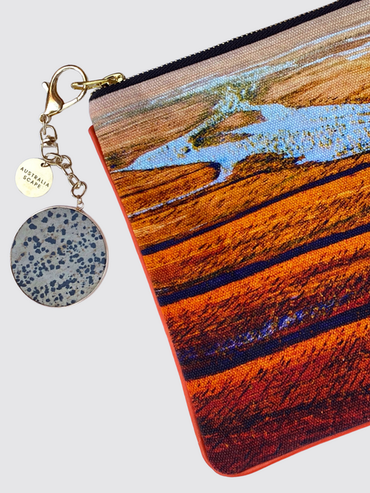 The Simpson Desert clutch bag comes with a steel zipper and leopard stone charm.