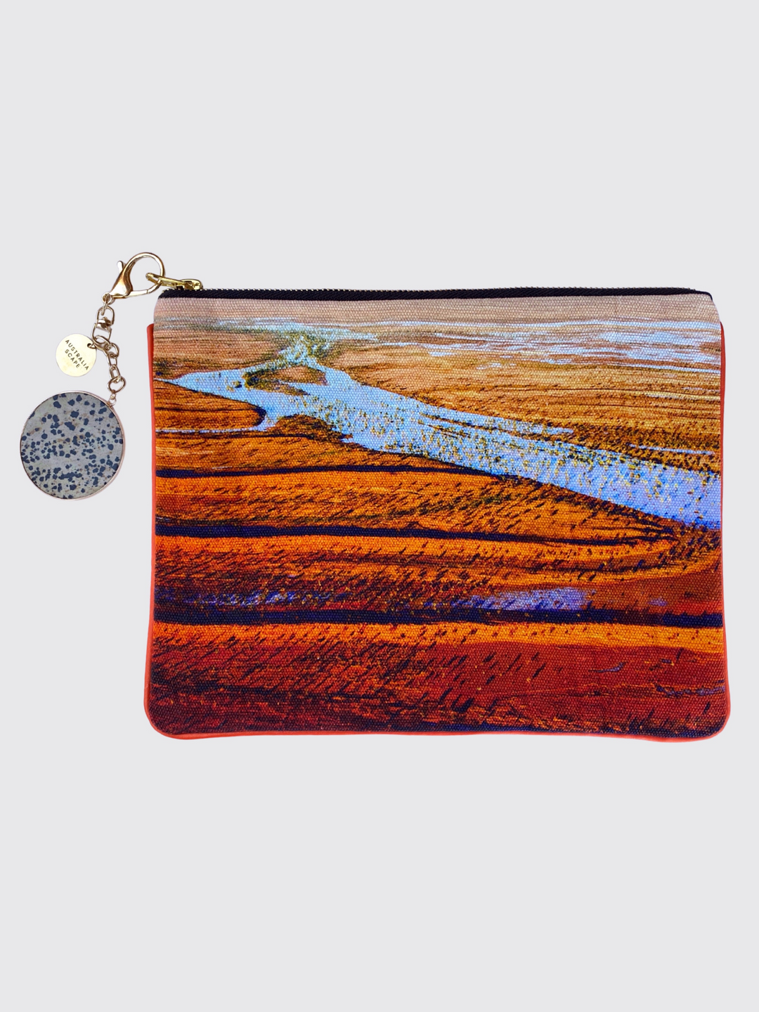 The Simpson Desert clutch bag - showing water rising to the surface from the Great Artesian Basin below and bringing the land to life.