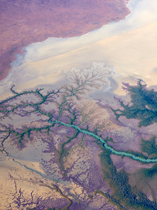 A remarkable aerial image of an Alligator Rivers landscape in the Northern Territory – showing the incredible network of tributaries adding to the flow north into the Timor Sea.