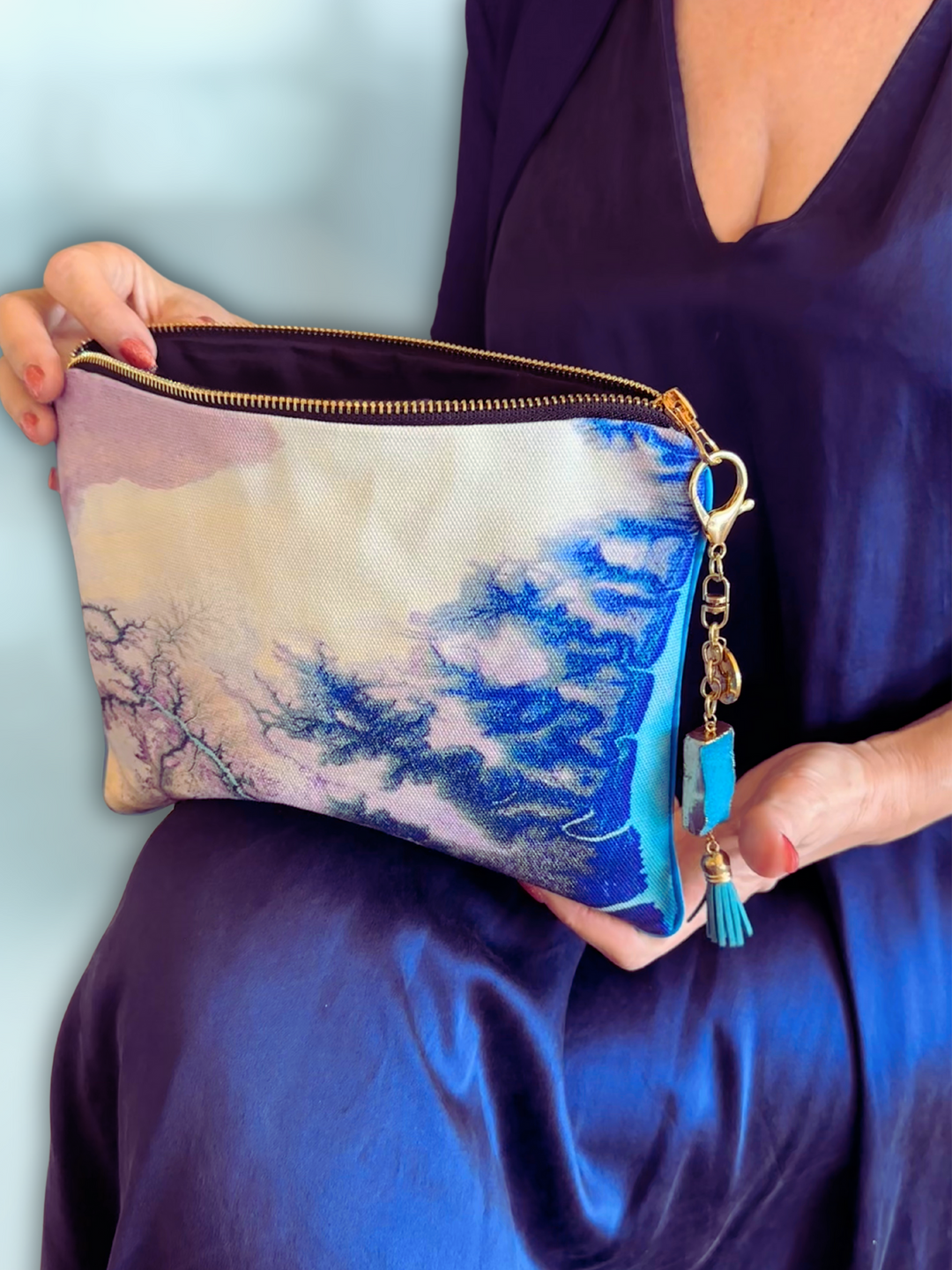 Australia Scape designer cotton canvas clutch bag depicting the Alligator Rivers landscape in blue and emerald tones.