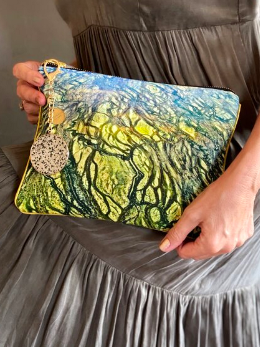 Australia Scape designer cotton canvas clutch bag depicting the Diamantina River landscape in green and gold tones.