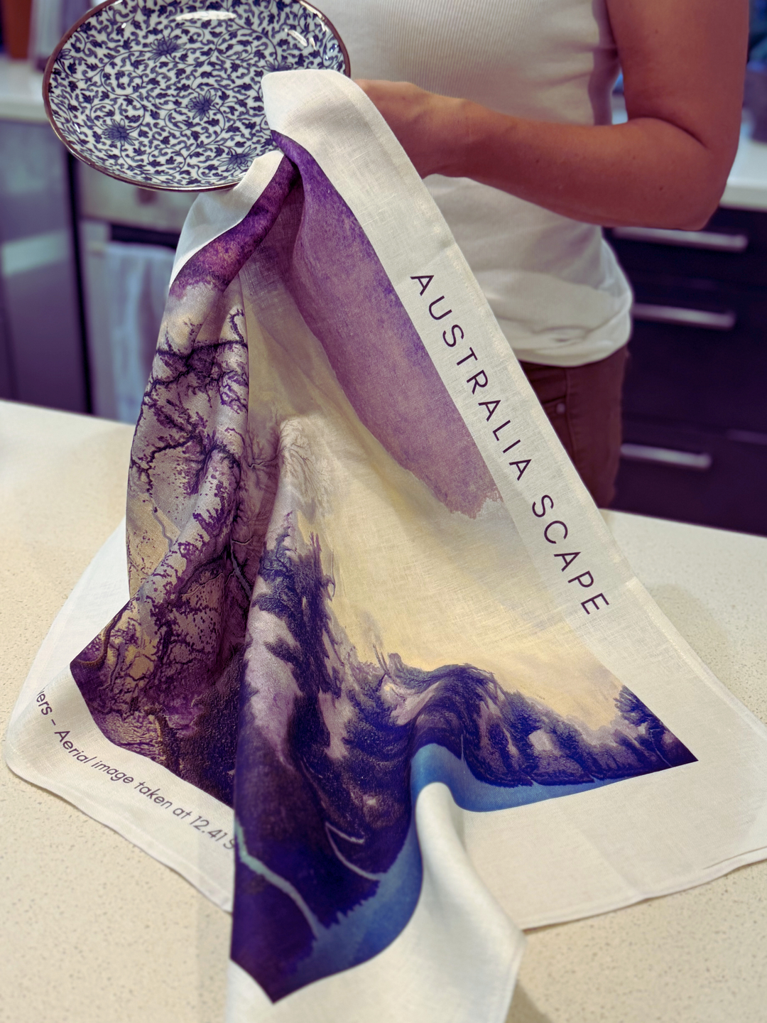 Australia Scape designer tea towel in 100% linen depicting the Alligator Rivers landscape in blue and emerald tones.