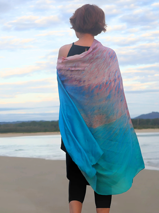 Australia Scape designer scarf in 100% silk depicting the Broome landscape in blue and pink tones.