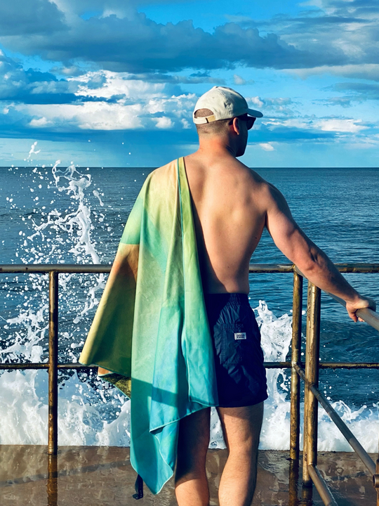 Australia Scape recycled microfibre suede beach towel depicting the Shark Bay seagrass meadows in jade and gold tones.